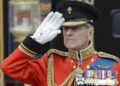 (FILES) In this file photo taken on June 16, 2012, Britain's Prince Philip, Duke of Edinburgh salutes as he watches the troops ride past outside Buckingham Palace following the Queen's Birthday Parade, 'Trooping the Colour' at Horse Guards Parade in London . - Queen Elizabeth II's 99-year-old husband, Prince Philip, has been moved back to a private hospital to recuperate from a heart procedure at a specialist cardiac unit, Buckingham Palace said on March 5, 2021. (Photo by LEON NEAL / AFP)
