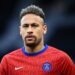 (FILES) In this file photo taken on May 16, 2021 Paris Saint-Germain's Brazilian forward Neymar looks on as he warms up before the French L1 football match between Paris Saint-Germain and Stade de Reims at the Parc des Princes stadium in Paris. - Nike said on May 27, 2021 that it parted ways with Neymar last year after the superstar Brazil attacker "refused to cooperate in a good faith" as the company investigated an employee's claim that he sexually assaulted her. The apparel giant said in a statement that its investigation into the alleged 2016 incident -- which was reported to the company in 2018 -- was inconclusive. (Photo by FRANCK FIFE / AFP)