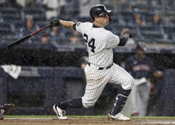 NEW YORK, NY - JULY 17: Gary Sanchez #24 of the New York Yankees hits a solo home run during the sixth inning against the Boston Red Sox at Yankee Stadium on July 17, 2021 in the Bronx borough of New York City.   Adam Hunger/Getty Images/AFP (Photo by Adam Hunger / GETTY IMAGES NORTH AMERICA / Getty Images via AFP)