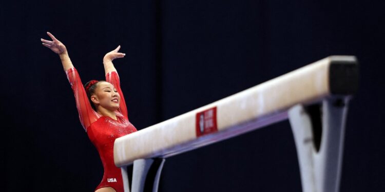 ST LOUIS, MISSOURI - JUNE 25: Kara Eaker smiles after landing her dismount off the balance beam during the Women's competition of the 2021 U.S. Gymnastics Olympic Trials at Americas Center on June 25, 2021 in St Louis, Missouri.   Jamie Squire/Getty Images/AFP (Photo by JAMIE SQUIRE / GETTY IMAGES NORTH AMERICA / Getty Images via AFP)
