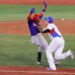South Korea's first baseman Oh Jaeil (R) tags Dominican Republic's Charlie Valerio (L) out during the sixth inning of the Tokyo 2020 Olympic Games baseball round 1 game between Dominican Republic and South Korea at Yokohama Baseball Stadium in Yokohama, Japan, on August 1, 2021. (Photo by KAZUHIRO FUJIHARA / AFP)