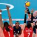 USA's Michelle Bartsch-Hackley (R) spikes the ball in the women's quarter-final volleyball match between USA and Dominican Republic during the Tokyo 2020 Olympic Games at Ariake Arena in Tokyo on August 4, 2021. (Photo by YURI CORTEZ / AFP)