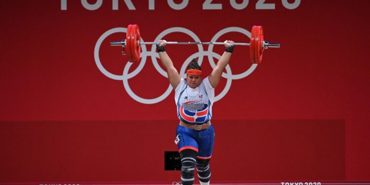 Dominican Republic's Veronica Estela Saladin Tolentino competes in the women's +87kg weightlifting competition during the Tokyo 2020 Olympic Games at the Tokyo International Forum in Tokyo on August 2, 2021. (Photo by Mohd RASFAN / AFP)
